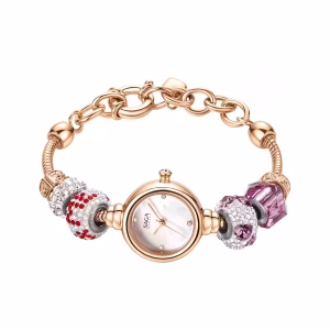 Saga Charm 53229-RGMWRG-7 – Nữ – Máy Quartz (Pin) – Mặt số xà cừ – Dây charm lấp lánh và quyến rũ